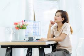 Girl thinking on a computer